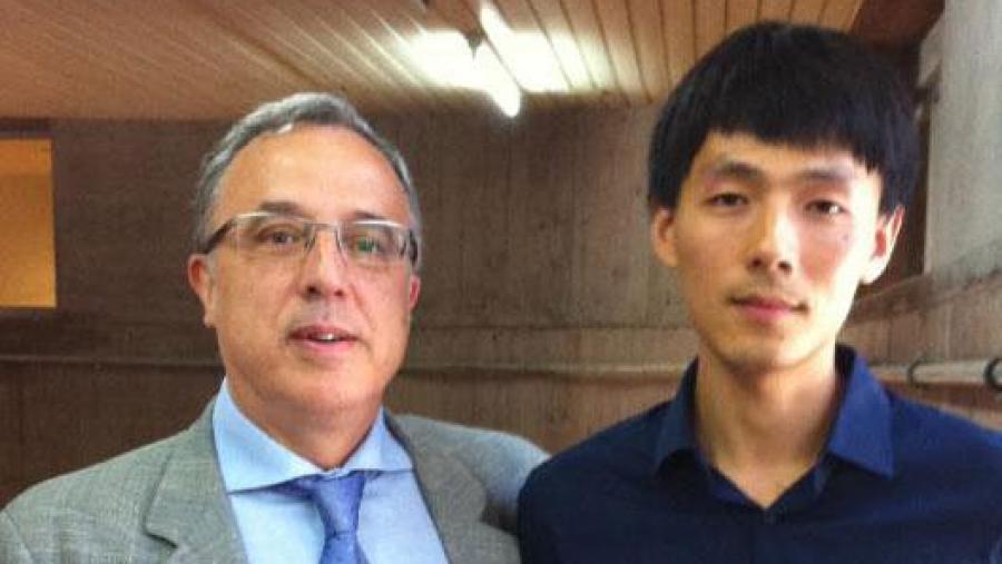 O Prof. Juan José Nieto Roig e o novo doutor Qing Tang O Prof. Juan José Nieto Roig e o novo doutor Qing Tang
